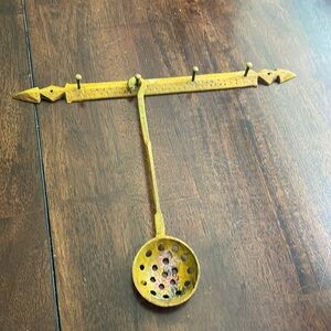 Vintage wrought iron hanger and spoon